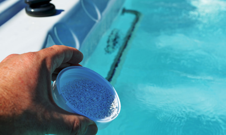 how to lower bromine level in hot tub